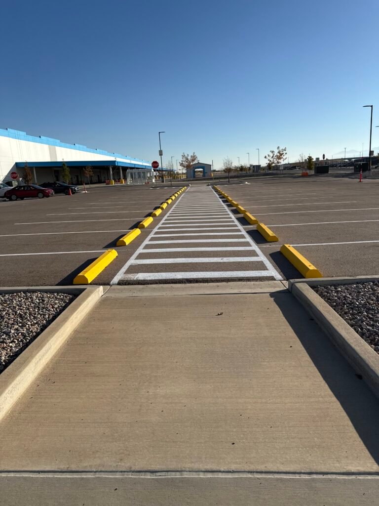 Crosswalk striping and curb paint marking commercial site access